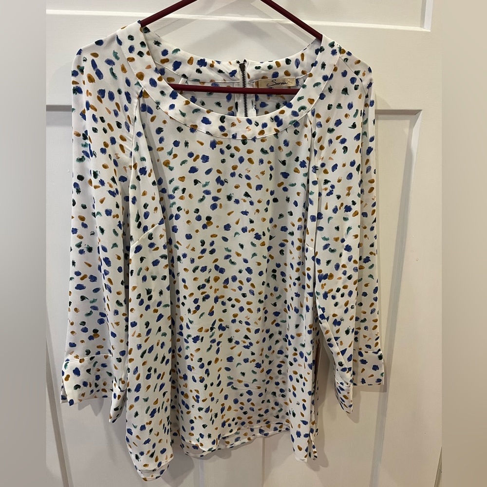 Jinnie zipper detail blouse.